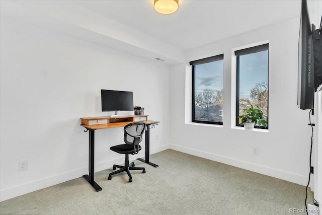 view of carpeted office space