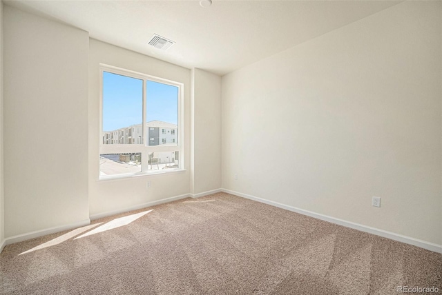 view of carpeted spare room