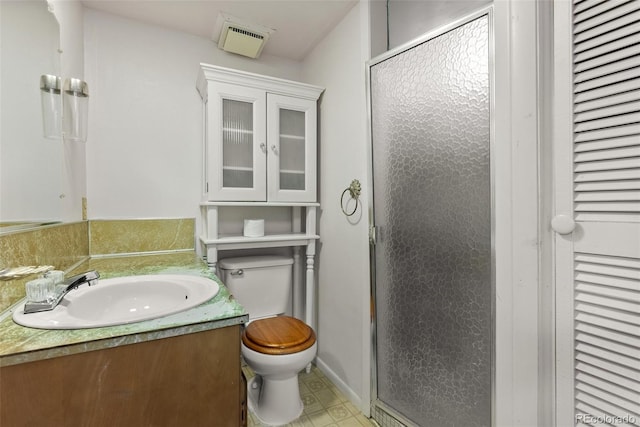 full bath featuring toilet, a shower stall, visible vents, and vanity