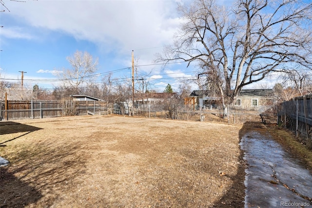 view of yard featuring fence