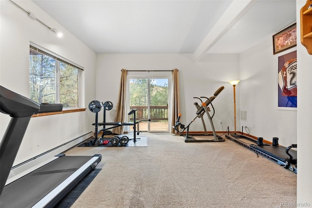 workout area with carpet floors and baseboard heating