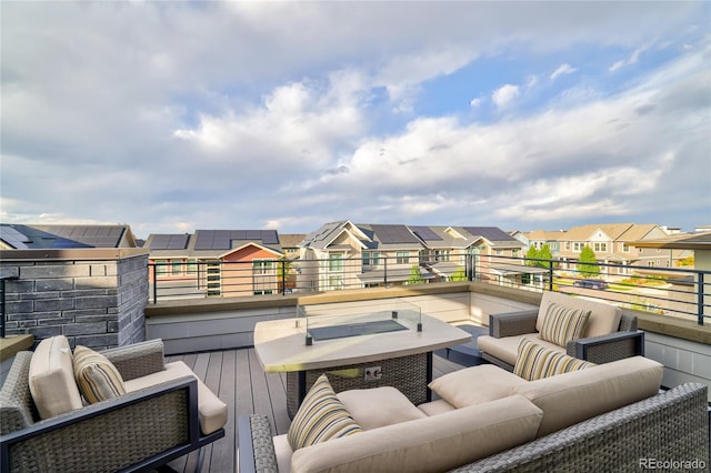 wooden deck featuring an outdoor hangout area