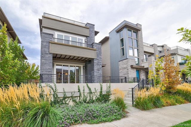 contemporary home featuring a balcony