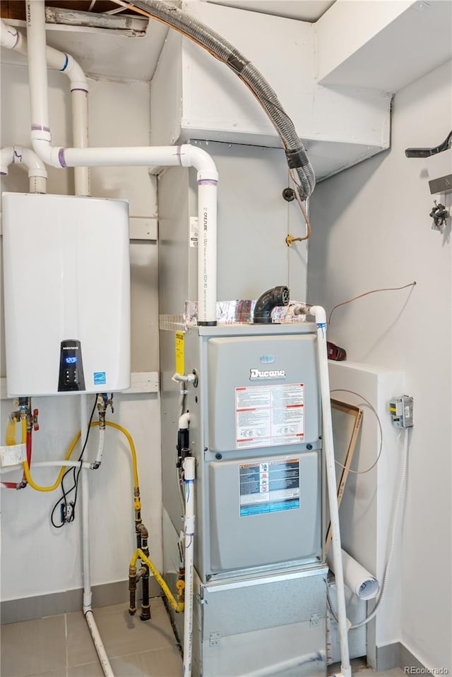 utility room with water heater