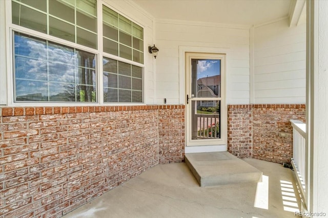 2142 Paint Pony Cir, Castle Rock, CO 80108 - property entrance featuring a porch and brick siding