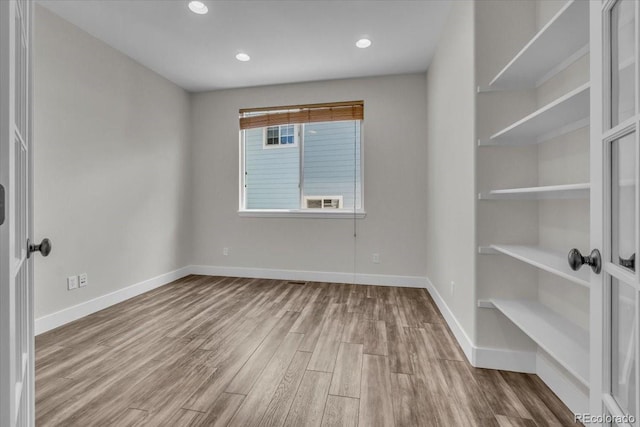 2142 Paint Pony Cir, Castle Rock, CO 80108 - empty room with wood finished floors and recessed lighting