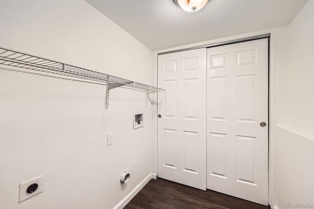 laundry area featuring electric dryer hookup, dark hardwood / wood-style floors, and washer hookup