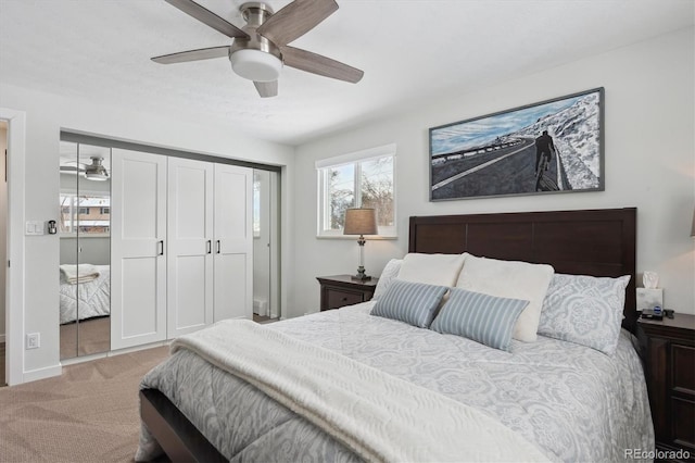 bedroom with ceiling fan and carpet