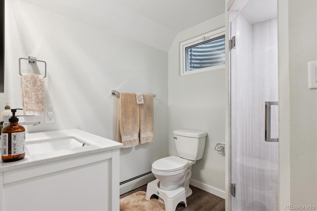 bathroom featuring walk in shower, toilet, vaulted ceiling, a baseboard radiator, and hardwood / wood-style flooring