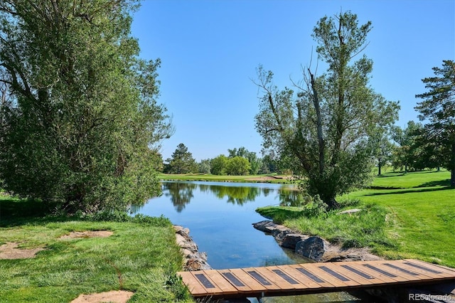 10111 Inverness Main St Unit 230, Englewood, CO 80112 - dock area featuring a water view and a lawn