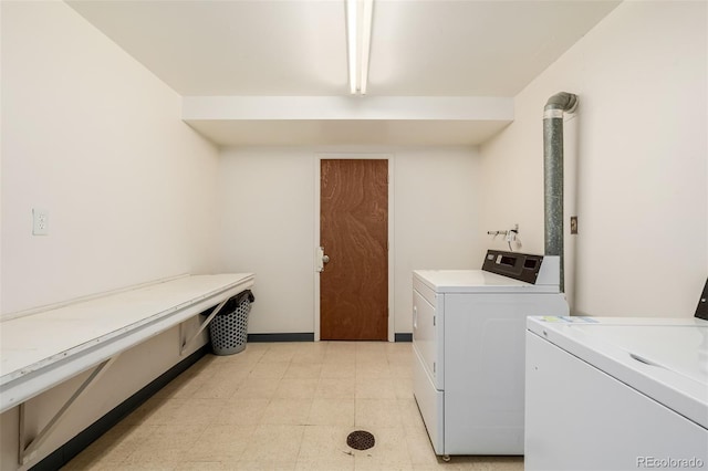 laundry area featuring independent washer and dryer