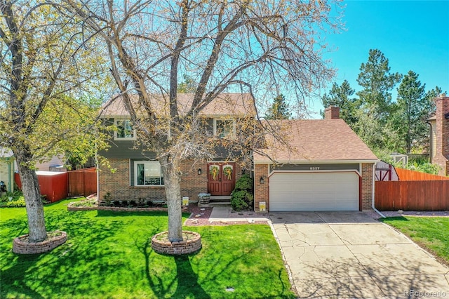 traditional-style house featuring brick siding, an attached garage, fence, and driveway