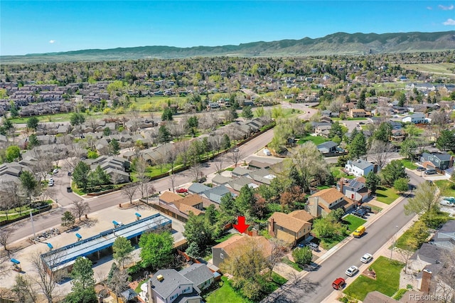 drone / aerial view with a mountain view and a residential view