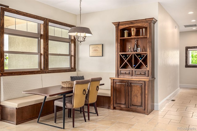 dining room with light tile flooring