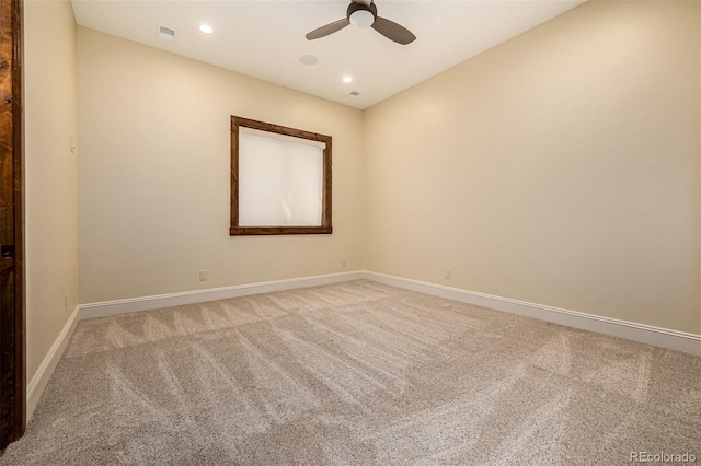 carpeted empty room with ceiling fan