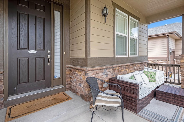 doorway to property featuring covered porch