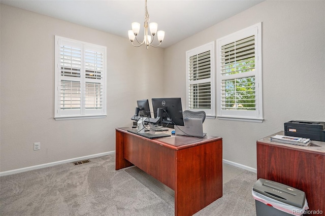 office featuring light carpet and a chandelier