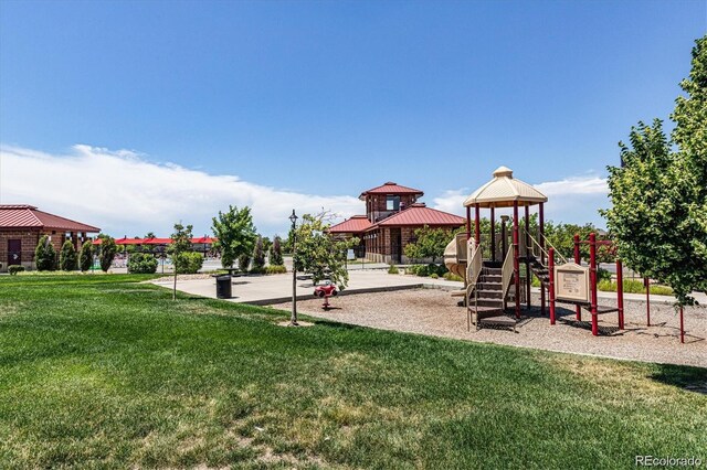 view of playground featuring a lawn