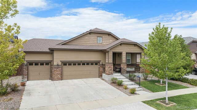 craftsman inspired home featuring a garage