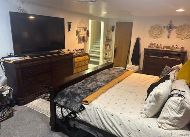 carpeted bedroom with visible vents