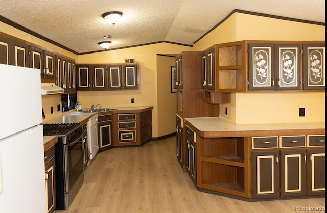 kitchen with a textured ceiling, white appliances, vaulted ceiling, exhaust hood, and light hardwood / wood-style floors