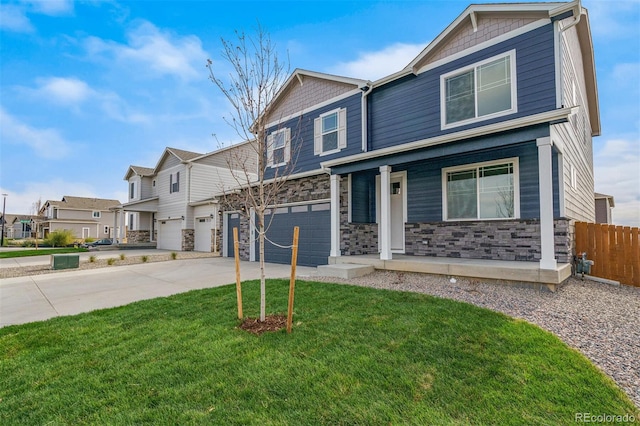 13466 Valentia St, Thornton, CO 80602 - craftsman house with a garage, driveway, stone siding, a porch, and a residential view