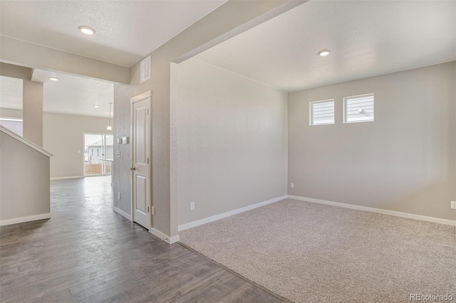 13466 Valentia St, Thornton, CO 80602 - empty room with baseboards, wood finished floors, and recessed lighting