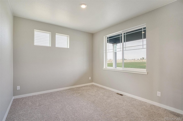 13466 Valentia St, Thornton, CO 80602 - carpeted spare room with plenty of natural light and baseboards