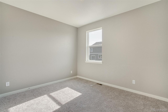 13466 Valentia St, Thornton, CO 80602 - carpeted empty room featuring baseboards