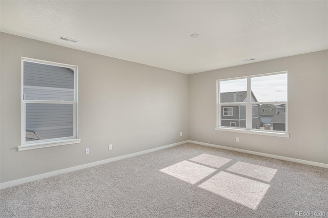 13466 Valentia St, Thornton, CO 80602 - empty room with carpet flooring and baseboards