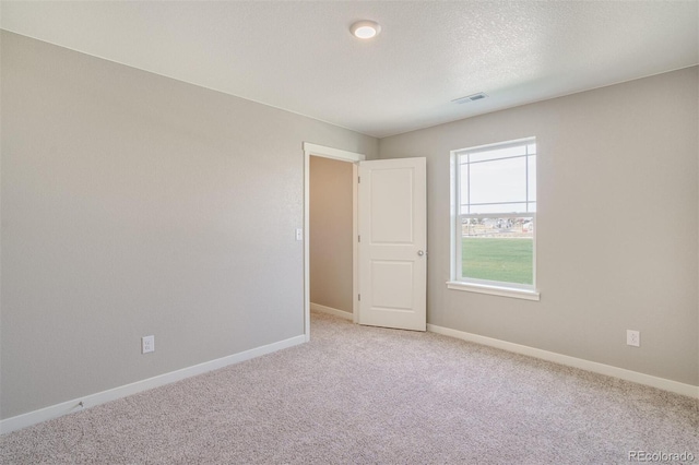 13466 Valentia St, Thornton, CO 80602 - empty room with light carpet and baseboards