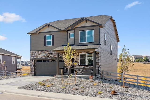 view of front of property with a garage and a porch