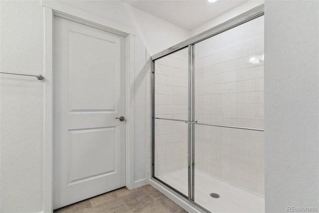 bathroom with an enclosed shower