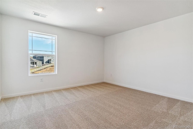 view of carpeted spare room