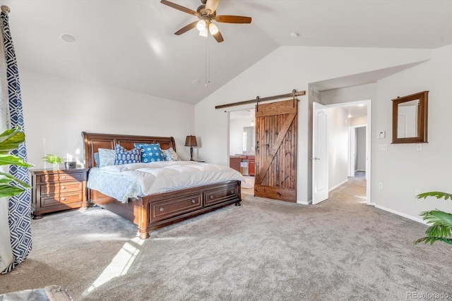 carpeted bedroom with a ceiling fan, lofted ceiling, baseboards, and a barn door