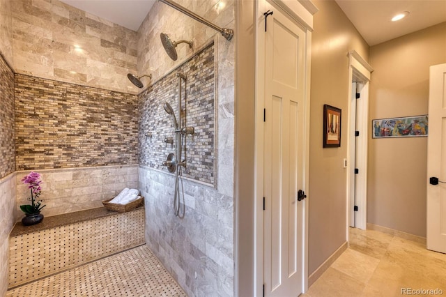 bathroom featuring a tile shower