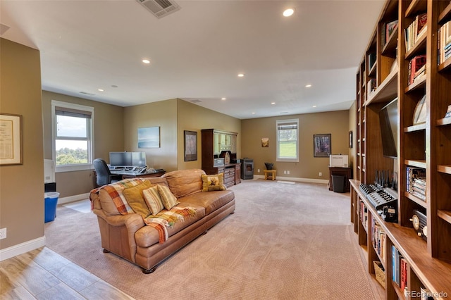 living room with light colored carpet