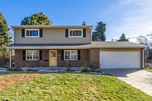 view of front property featuring a garage and a front lawn