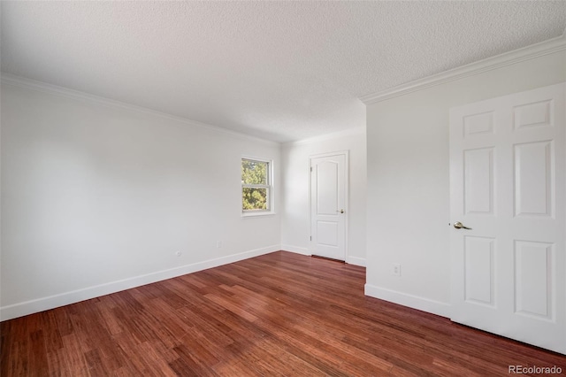 3870 S Ouray Way, Aurora, CO 80013 - unfurnished room with crown molding, wood finished floors, and a textured ceiling