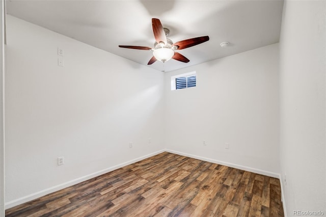 3870 S Ouray Way, Aurora, CO 80013 - spare room with wood finished floors, a ceiling fan, and a smoke detector