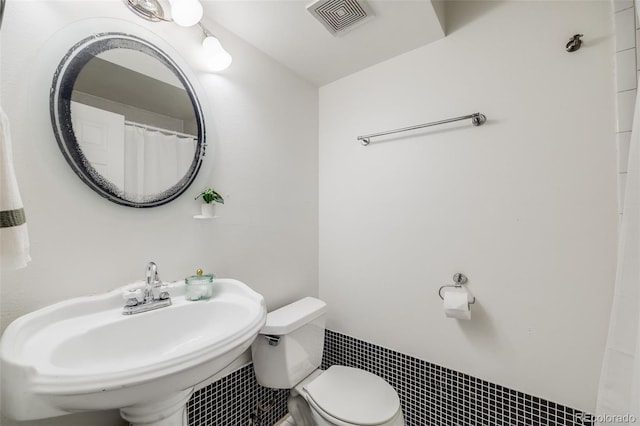 3870 S Ouray Way, Aurora, CO 80013 - bathroom with toilet and a sink