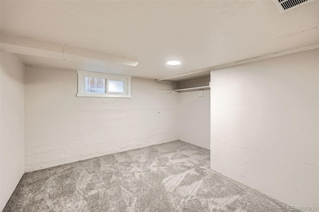 basement featuring carpet flooring