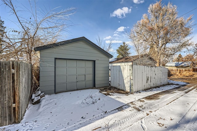 view of snow covered garage