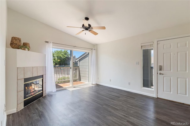 3825 Canyon Ranch Rd Unit 203, Highlands Ranch, CO 80126 - unfurnished living room with lofted ceiling, a ceiling fan, dark wood-style flooring, and a tile fireplace