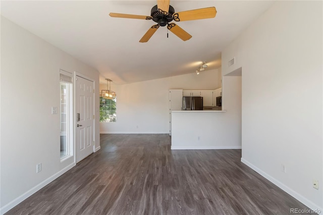 3825 Canyon Ranch Rd Unit 203, Highlands Ranch, CO 80126 - unfurnished living room featuring lofted ceiling, dark wood-style flooring, and ceiling fan