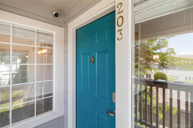3825 Canyon Ranch Rd Unit 203, Highlands Ranch, CO 80126 - property entrance featuring a security system and covered porch