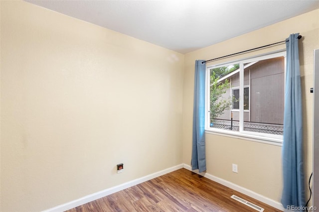 1209 Maxwell St, Colorado Springs, CO 80906 - unfurnished room with baseboards and wood finished floors