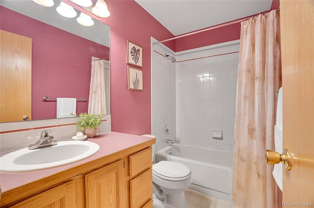 full bath with toilet, shower / tub combo with curtain, and vanity