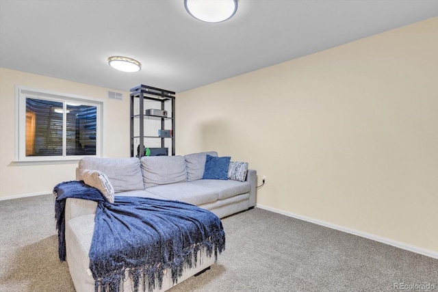 living room featuring carpet flooring, baseboards, and visible vents