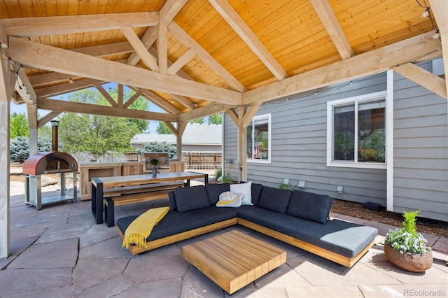 4815 Lucille Ct, Loveland, CO 80537 - view of patio / terrace featuring an outdoor hangout area, a gazebo, area for grilling, and outdoor dining area